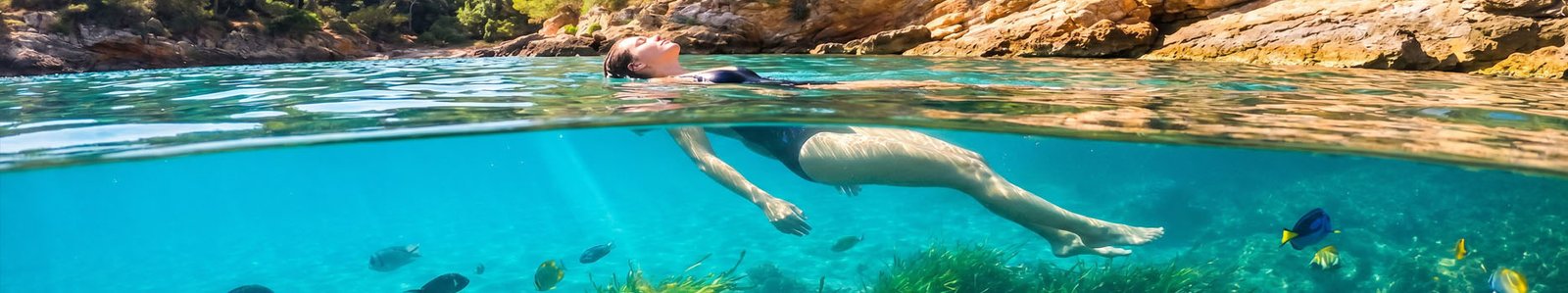 Person swimming in clear water with visible fish below the surface, illustration of a preserved aquatic environment